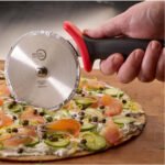 Mercer Culinary Millennia Pizza Cutter with Red Handle, 4 Inch Wheel, Stainless Steel
