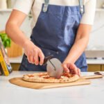 Ooni Professional Pizza Cutter Wheel - Ø4.4″ Blade - Classic Stainless Steel Pizza Wheel Cutter with Green Handle